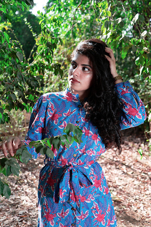 girl wearing a Blue hand block printed shirt dress with a belt in the woods